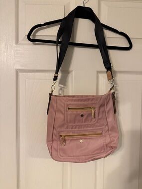 Woman’s canvas crossbody/shoulder bag by Utility in rose pink